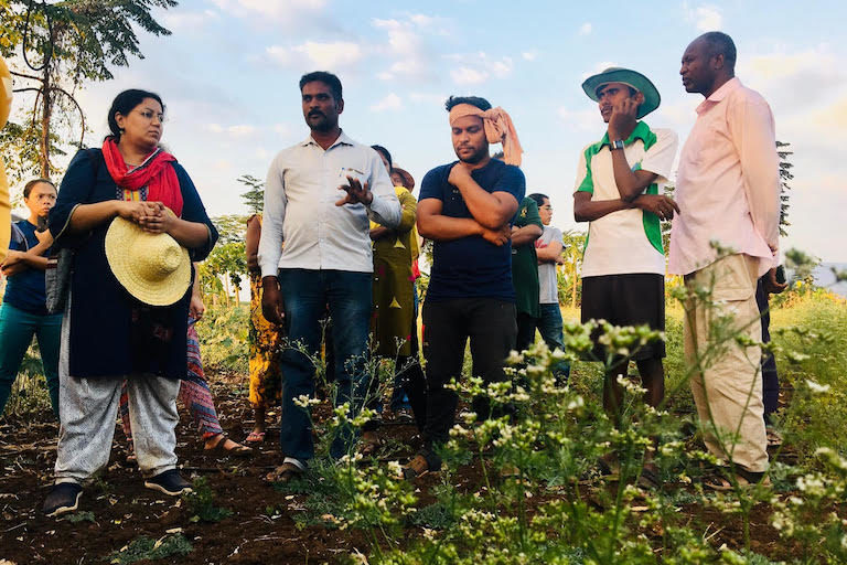 Agroecology practitioners share views and experiences during an international learning exchange in early 2020 at Amrita Bhoomi Learning Centre. Image by Anna Lappé for Mongabay.